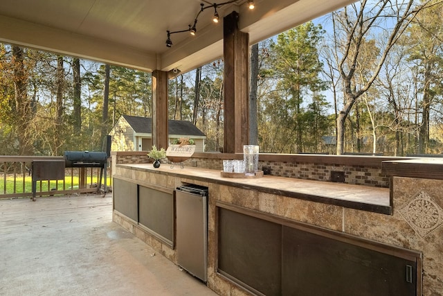 view of patio with an outdoor kitchen