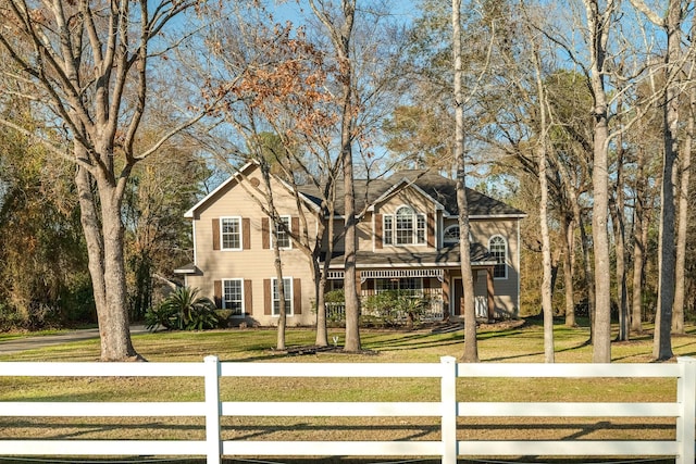 view of property with a front lawn