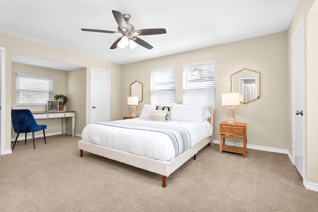 410 Indian Shr, Livingston, TX 77351 - carpeted bedroom with baseboards and ceiling fan