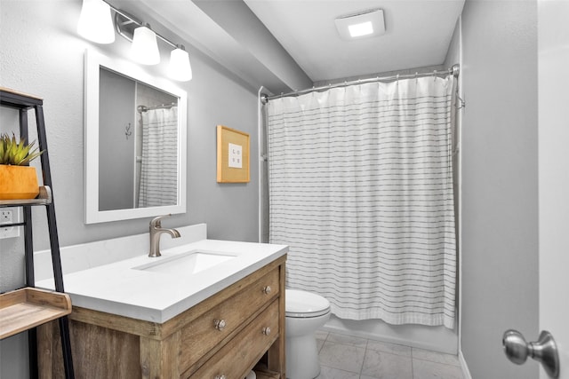 410 Indian Shr, Livingston, TX 77351 - bathroom featuring vanity and marble look tiles