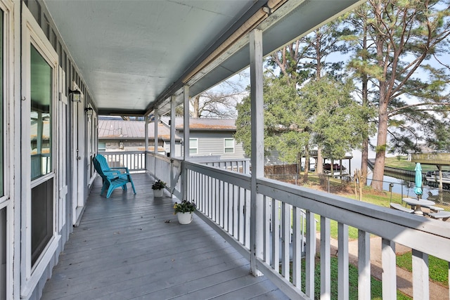 wooden deck featuring covered porch