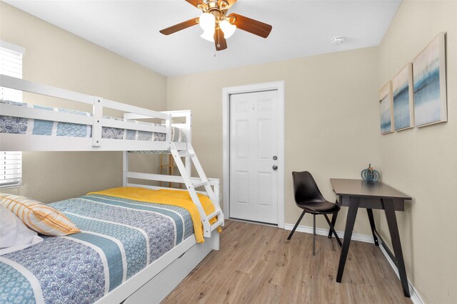 bedroom featuring ceiling fan and light wood-type flooring