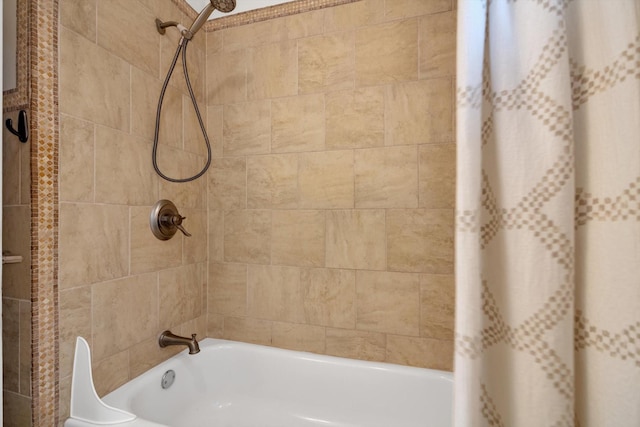 bathroom with shower / tub combo