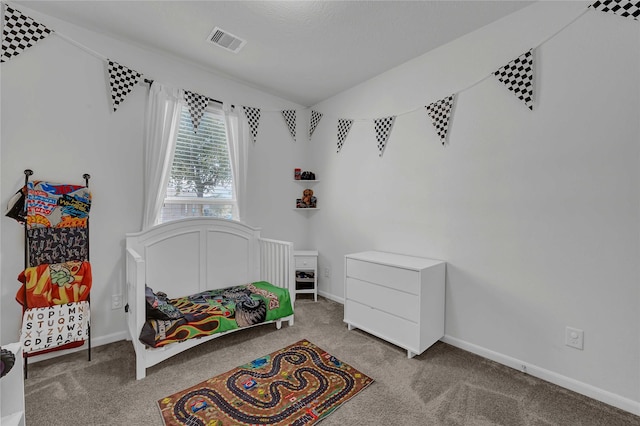 carpeted bedroom featuring vaulted ceiling