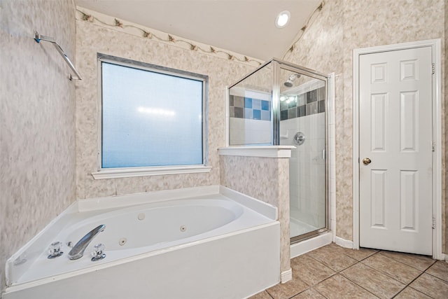 bathroom with tile patterned floors, plus walk in shower, and vaulted ceiling