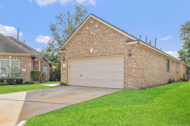 view of side of property with a lawn and central air condition unit