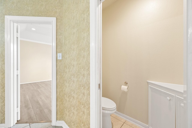 bathroom with tile patterned flooring and toilet