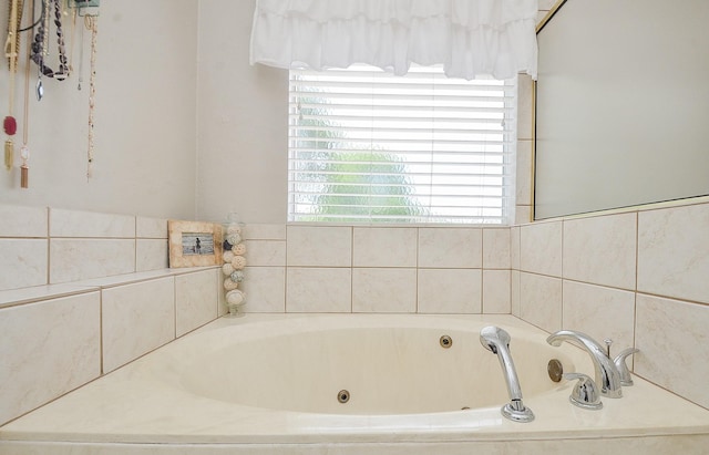 bathroom with a relaxing tiled tub