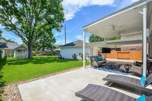 view of patio / terrace featuring an outdoor hangout area, an outbuilding, and ceiling fan