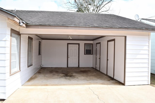 exterior space with a carport