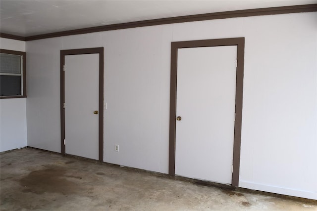 unfurnished room featuring ornamental molding