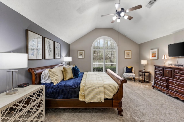 bedroom featuring vaulted ceiling, ceiling fan, and carpet flooring