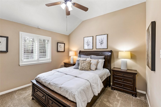 bedroom featuring lofted ceiling, ceiling fan, and carpet flooring