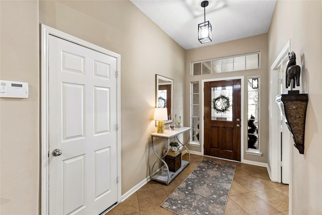 foyer with light tile patterned flooring