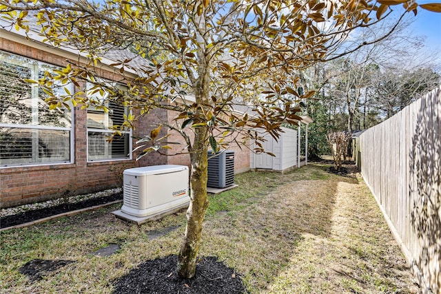 view of yard featuring central AC unit