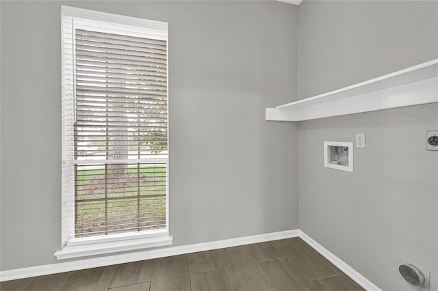 laundry room with dark wood-type flooring, hookup for a washing machine, and electric dryer hookup