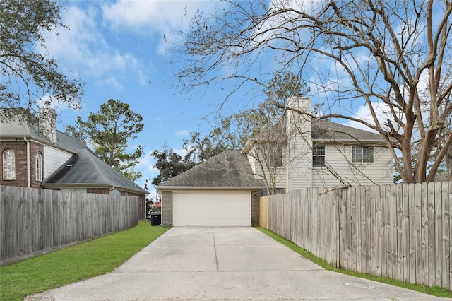 view of side of property with a garage