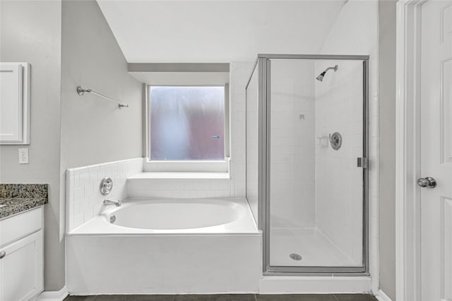 bathroom with vanity and plus walk in shower