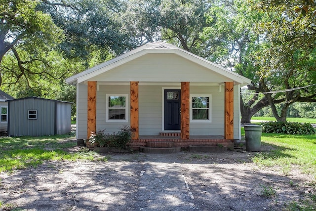 view of front facade with a shed