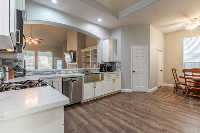 kitchen with ceiling fan, dishwasher, sink, and white cabinets