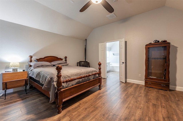 bedroom with ceiling fan, lofted ceiling, and dark hardwood / wood-style flooring