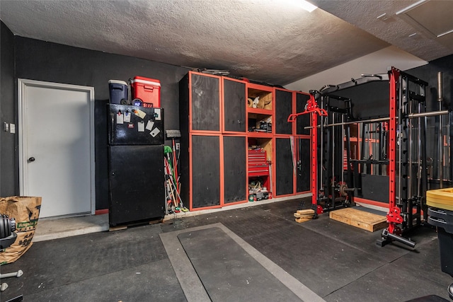 garage featuring black refrigerator