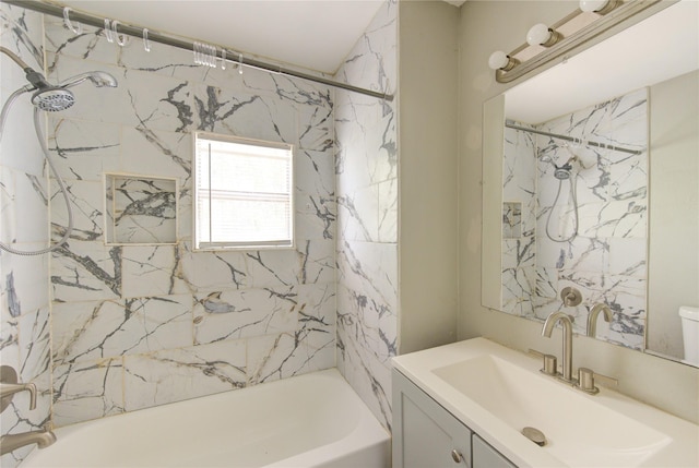 bathroom with shower / bathing tub combination and vanity