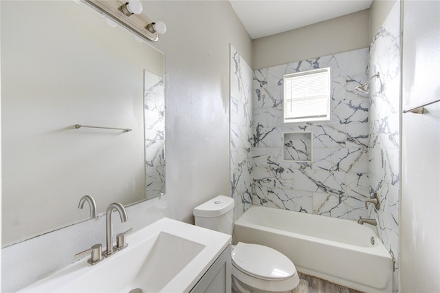 full bathroom featuring vanity, shower / tub combination, and toilet