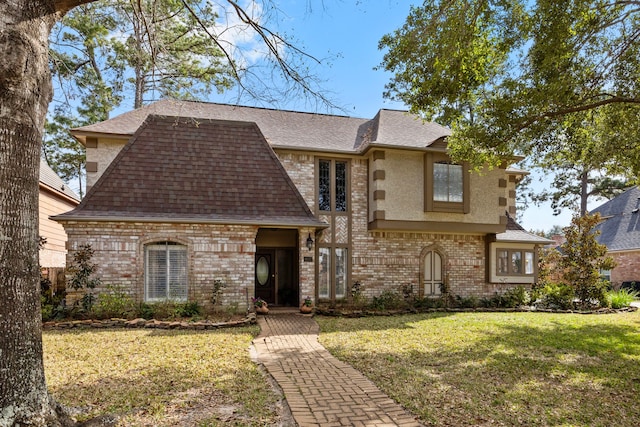 view of front of home featuring a front lawn