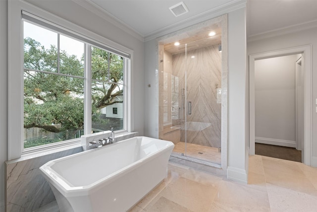 bathroom featuring crown molding and shower with separate bathtub