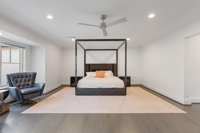 bedroom featuring ceiling fan and hardwood / wood-style floors