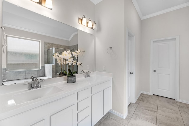 bathroom with ornamental molding, a shower with door, and vanity