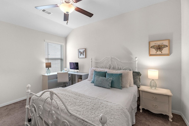 bedroom with vaulted ceiling, carpet floors, and ceiling fan