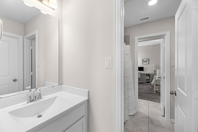 bathroom featuring vanity and tile patterned floors