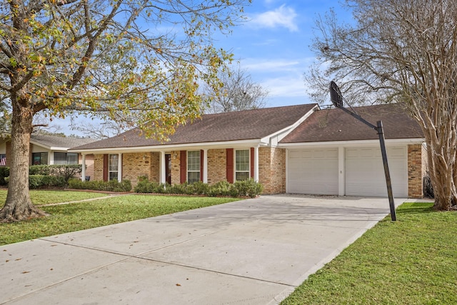 ranch-style home featuring a garage and a front lawn