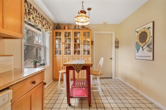 dining room featuring light tile patterned floors