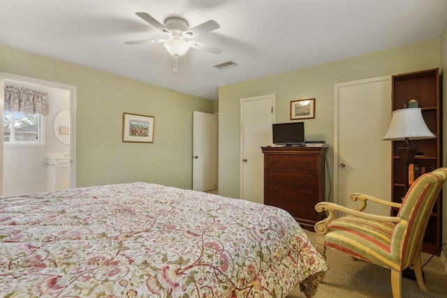 bedroom with ceiling fan and ensuite bathroom