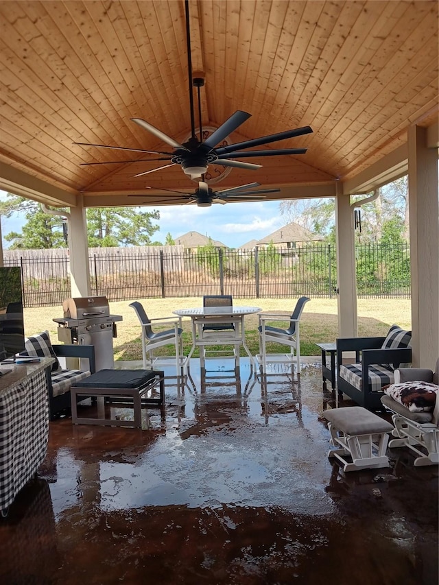 view of patio / terrace with area for grilling and ceiling fan