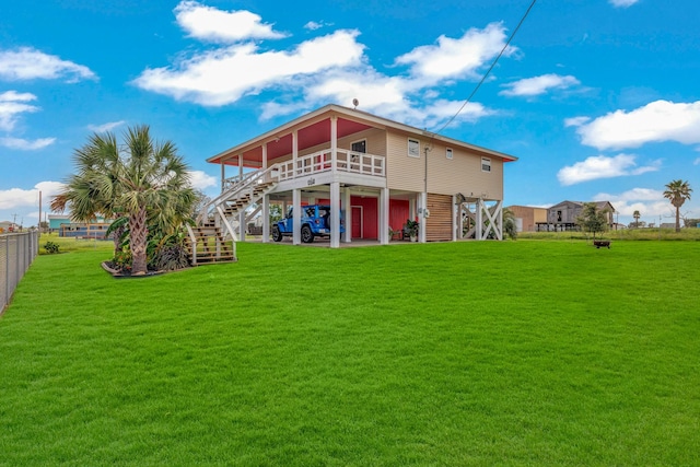 back of house with a yard