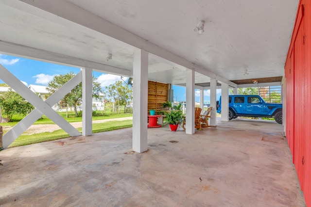 view of patio / terrace featuring a carport