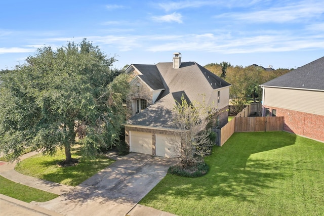 view of side of home with a garage and a lawn