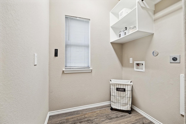 laundry area featuring laundry area, baseboards, wood finished floors, hookup for a washing machine, and hookup for an electric dryer