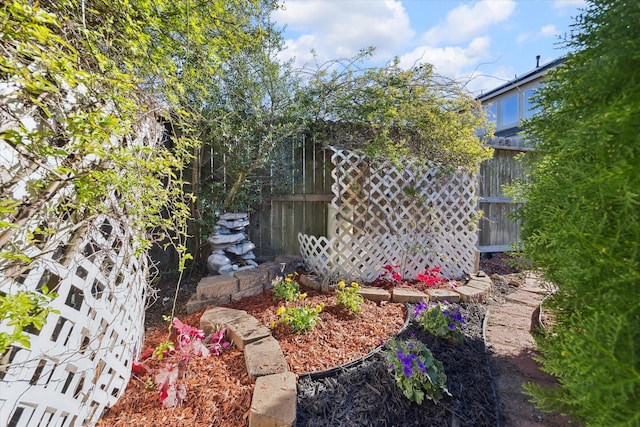 view of yard featuring fence