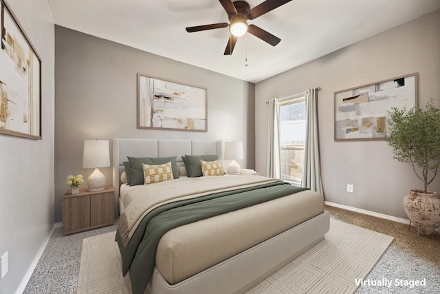 bedroom featuring a ceiling fan, light carpet, and baseboards