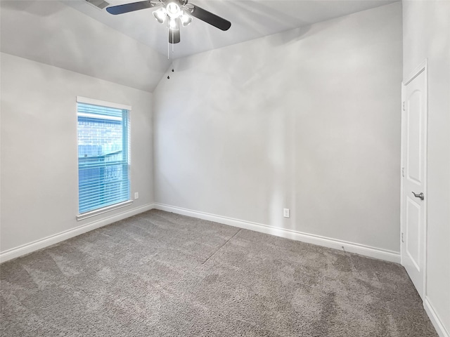 unfurnished room featuring vaulted ceiling, carpet floors, and ceiling fan