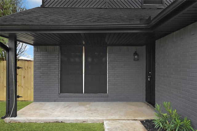 entrance to property featuring a patio area