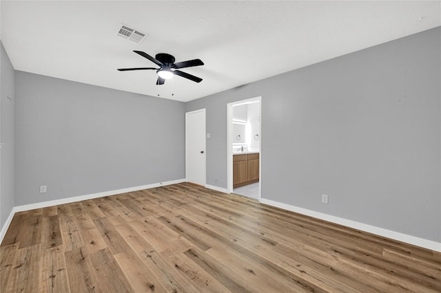 interior space with ceiling fan and light hardwood / wood-style floors