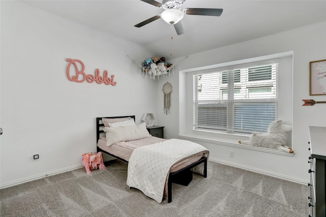 bedroom featuring lofted ceiling, carpet flooring, and ceiling fan