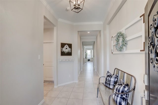 corridor featuring an inviting chandelier, light tile patterned floors, and crown molding