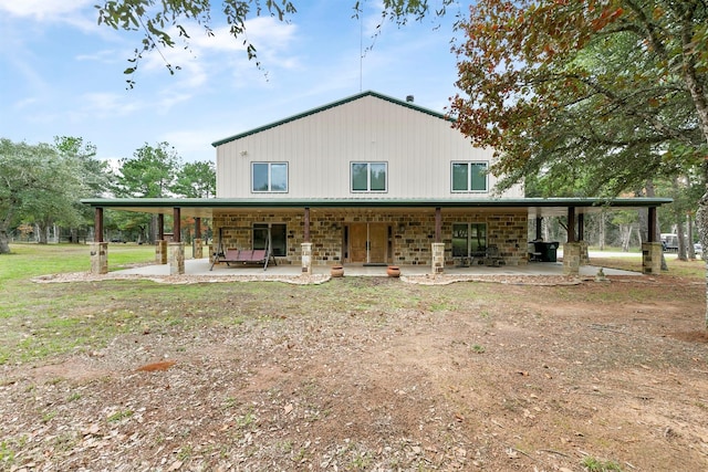 rear view of property with a patio